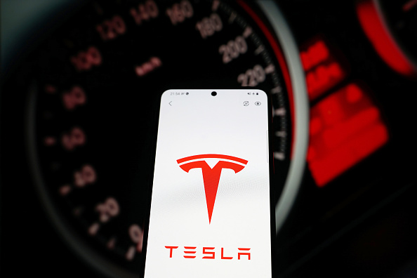 In this photo illustration a car brand logo